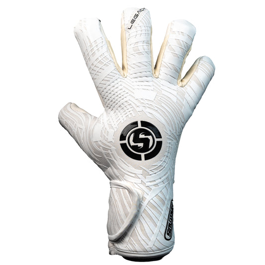 A white goalkeeper glove with a black circular logo on the back of the hand, featuring textured grip patterns and gold-toned finger tips, shown against a plain white background.