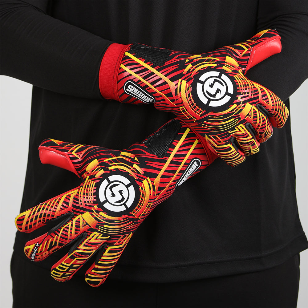 Hands wearing Adult Removable Strapless Goalkeeper Gloves, demonstrating the tight negative cut fit and flexibility.