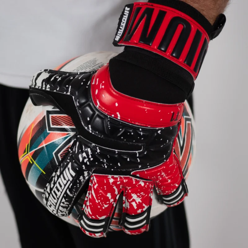 Saviour GK's high-performance red goalkeeper gloves with black accents in a negative hybrid cut.