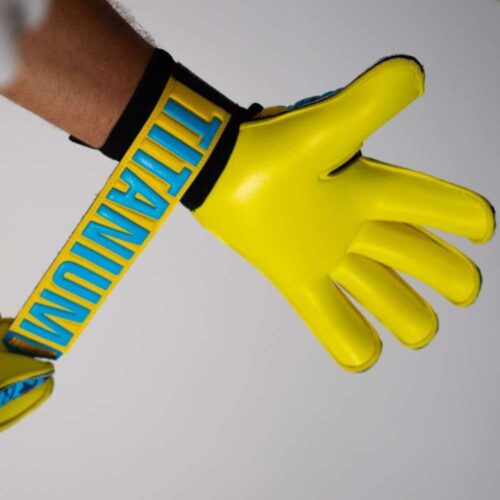 High-quality roll finger goalkeeper gloves in vibrant blue, featuring robust finger protection.
