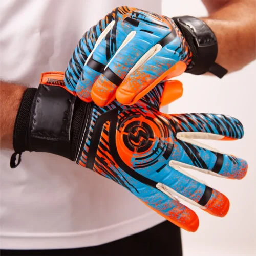 Goalkeeper confidently blocking a shot with high-performance elite keeper gloves.