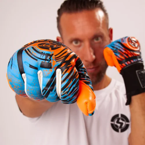 Goalkeeper in action, showcasing agility and precision with Elite Sport Goalie Gloves.
