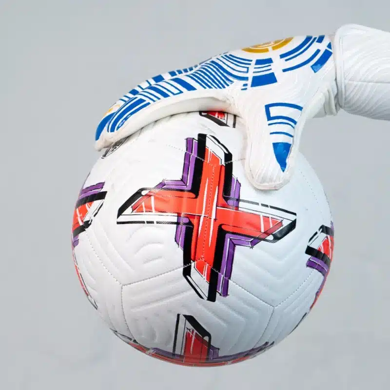 Keeper in motion, showcasing men’s One football goalkeeper gloves.