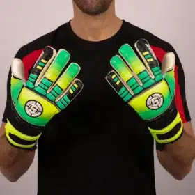 Detailed view of finger protection spines on yellow and green soccer GK gloves.