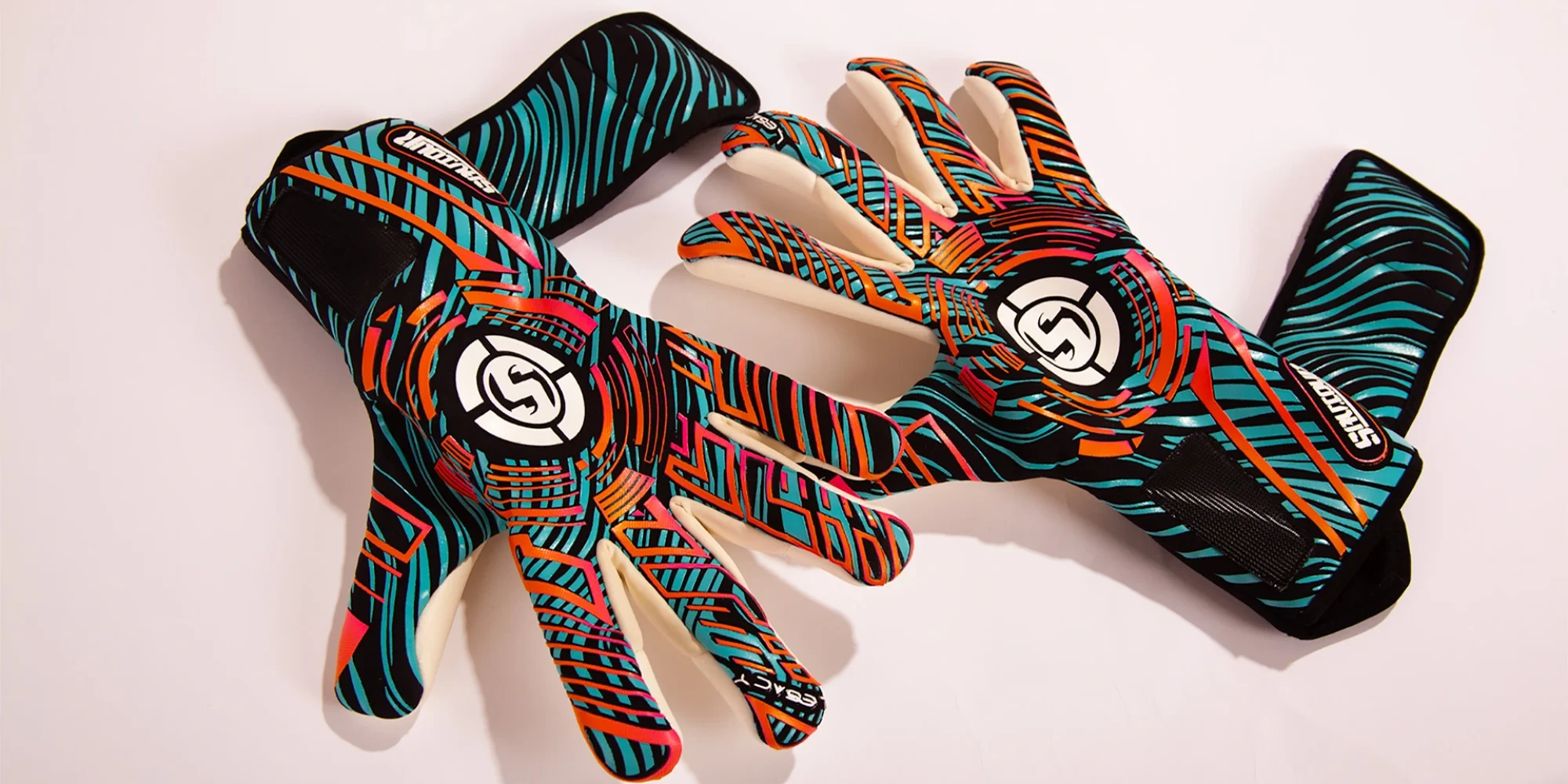 Explore Precision with Saviour goalkeeping Negative Cut Goalie Gloves SAVIOUR GK modern crafted negative cut goalie gloves on display.